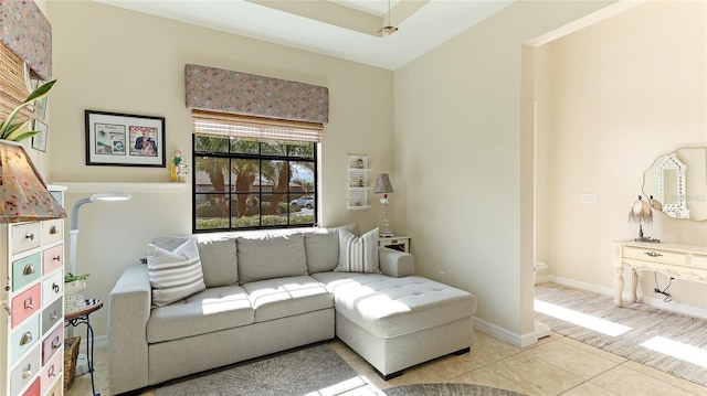 living room featuring light tile patterned flooring