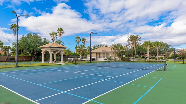 view of sport court with a gazebo