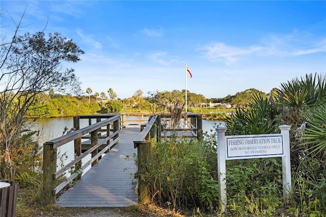 dock area featuring a water view