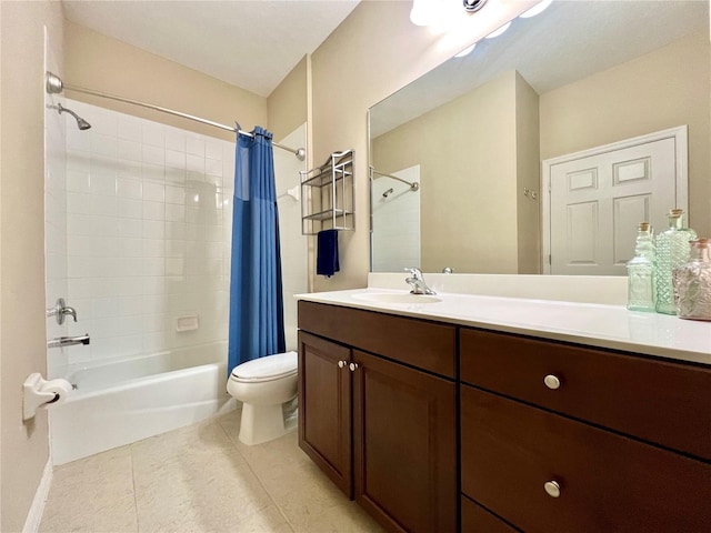 full bathroom with tile patterned floors, vanity, toilet, and shower / tub combo