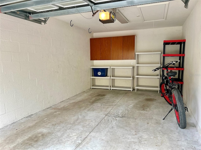 garage featuring a garage door opener