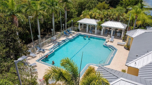 view of swimming pool with a gazebo and a patio area