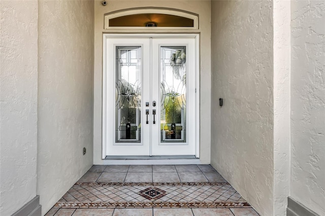 view of exterior entry with french doors