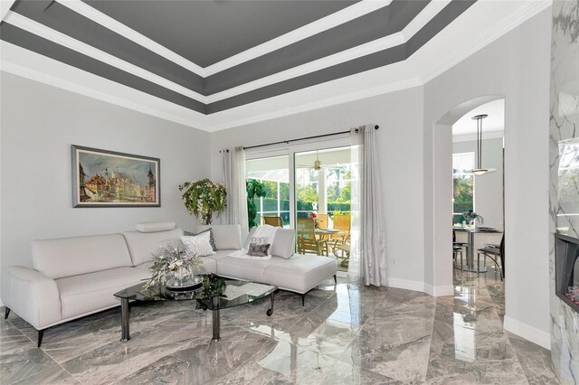 living room with ornamental molding