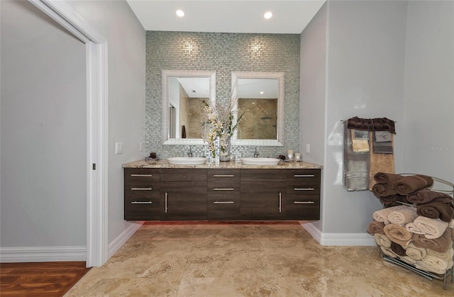 bathroom with backsplash and vanity