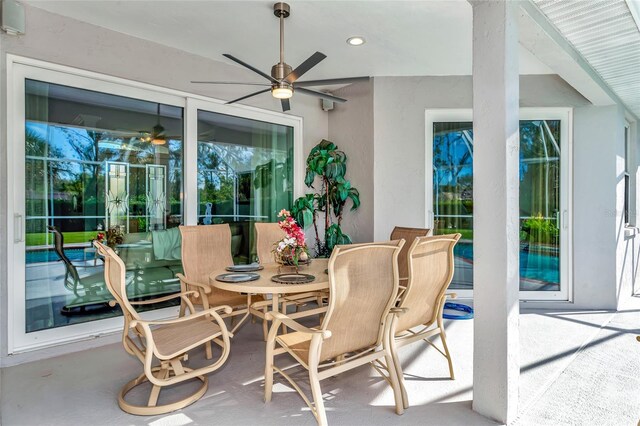 view of patio with ceiling fan