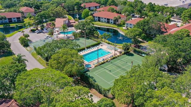 bird's eye view with a water view