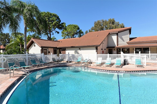 view of pool featuring a patio