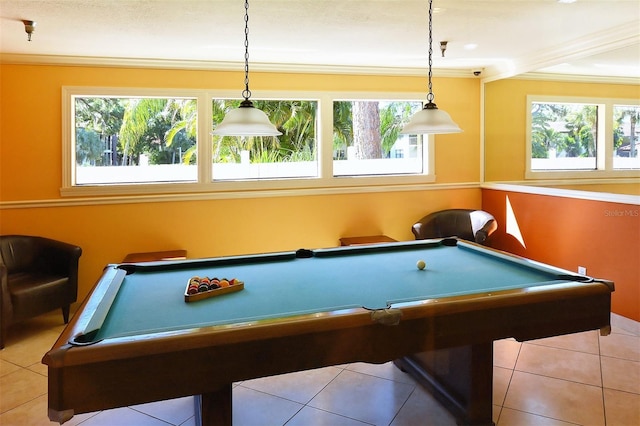 playroom with light tile patterned floors, a wealth of natural light, crown molding, and pool table