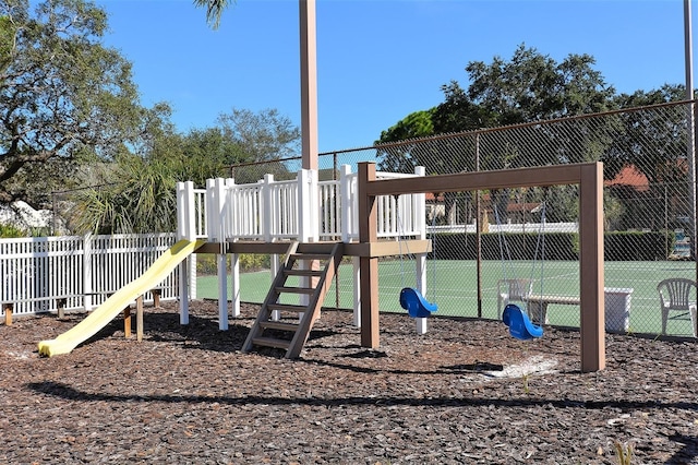 view of playground with basketball court