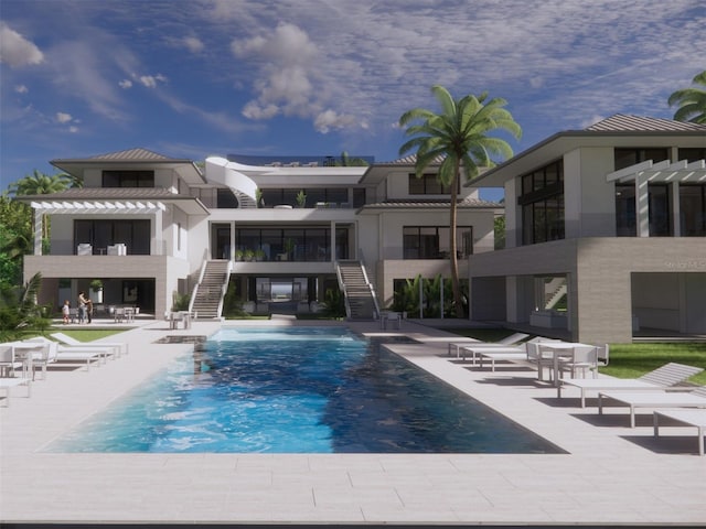 pool featuring stairs, a patio area, and a sunroom