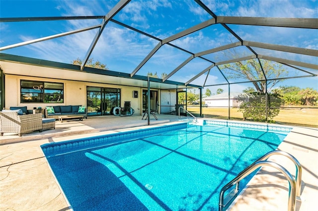 view of pool featuring an outdoor living space, a lanai, and a patio