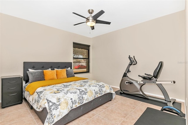 bedroom with light tile patterned floors and ceiling fan