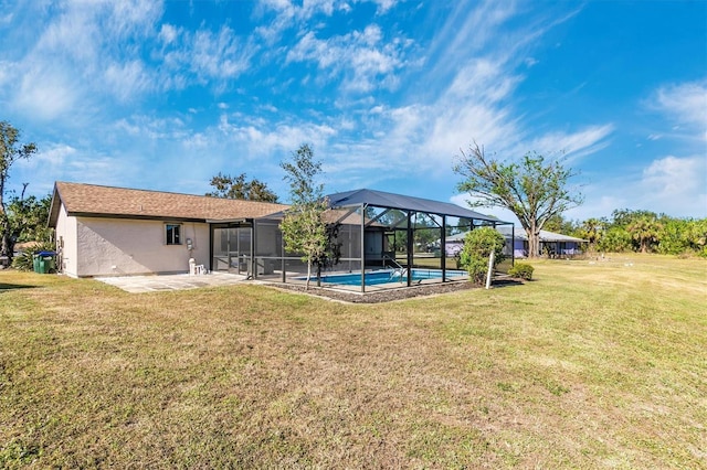 back of house with a patio, a lanai, an outdoor pool, a lawn, and stucco siding