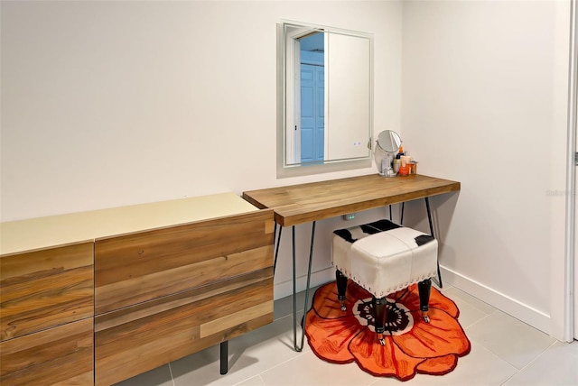 home office featuring light tile patterned flooring