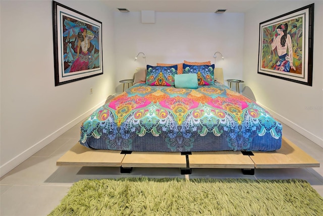 bedroom featuring tile patterned flooring