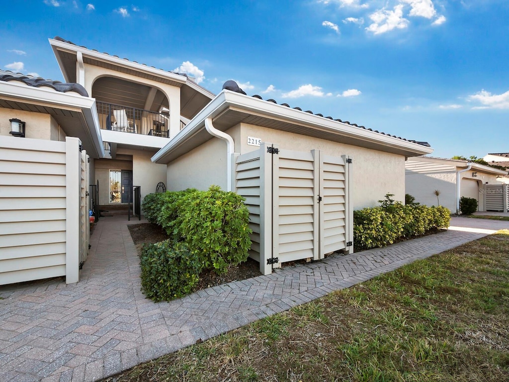 doorway to property featuring a balcony