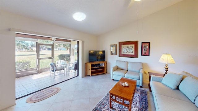 tiled living room featuring high vaulted ceiling