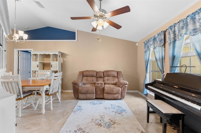 living room featuring light tile patterned floors, ceiling fan with notable chandelier, and lofted ceiling