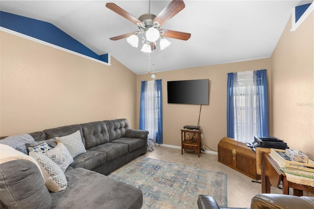 living room featuring ceiling fan and vaulted ceiling