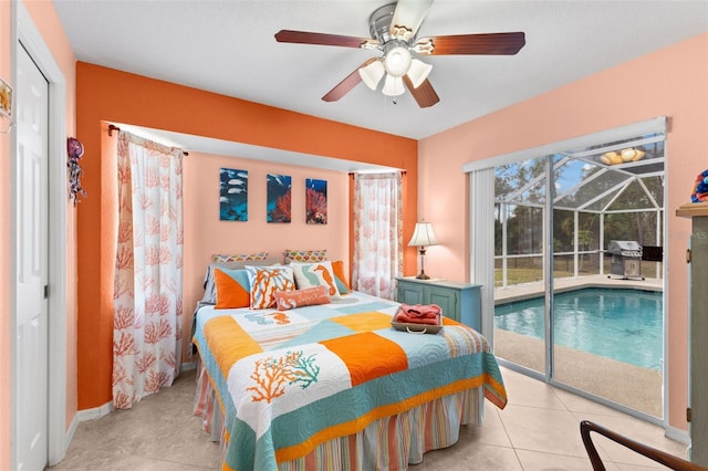 tiled bedroom with access to exterior, a closet, and ceiling fan