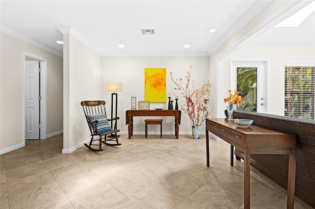 sitting room with crown molding