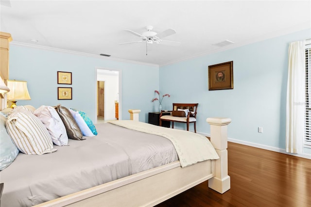 bedroom with dark hardwood / wood-style floors, ceiling fan, and crown molding