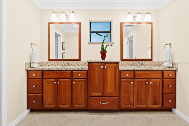 bathroom with backsplash, crown molding, and vanity