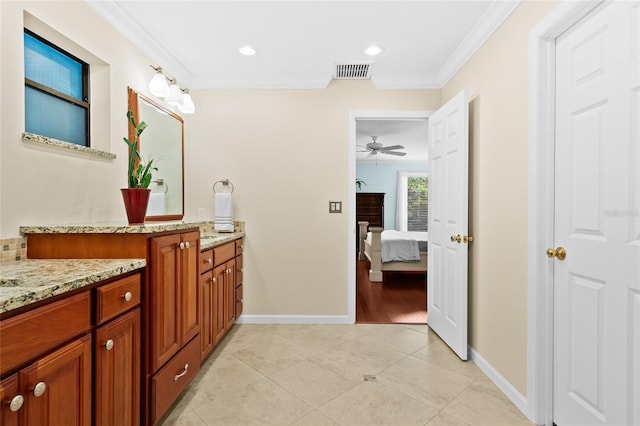 bathroom featuring tile patterned floors, ceiling fan, ornamental molding, and vanity