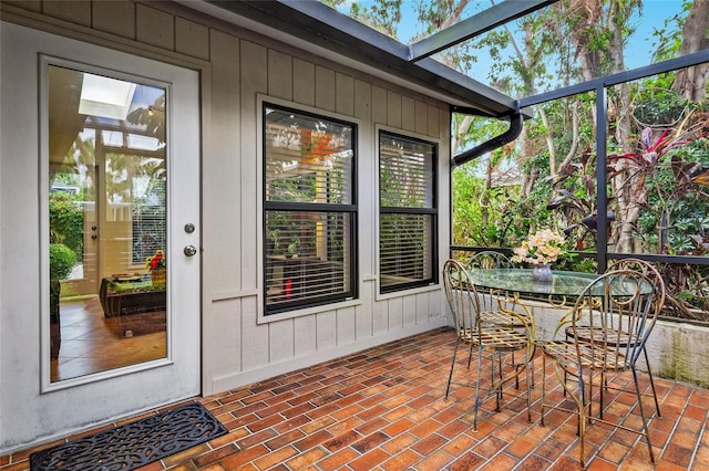 sunroom featuring a skylight