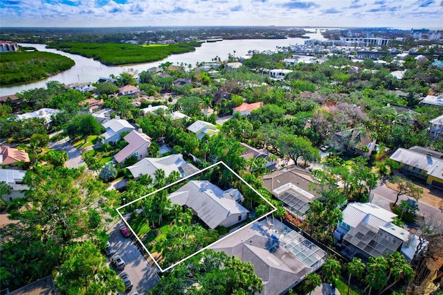 drone / aerial view with a water view