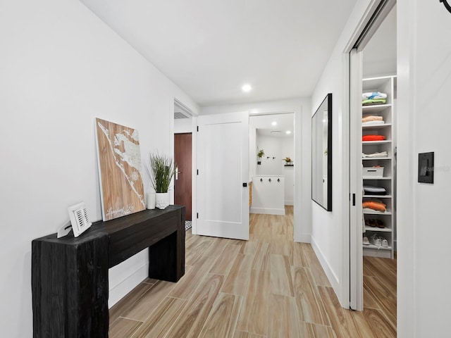 hall featuring light hardwood / wood-style flooring