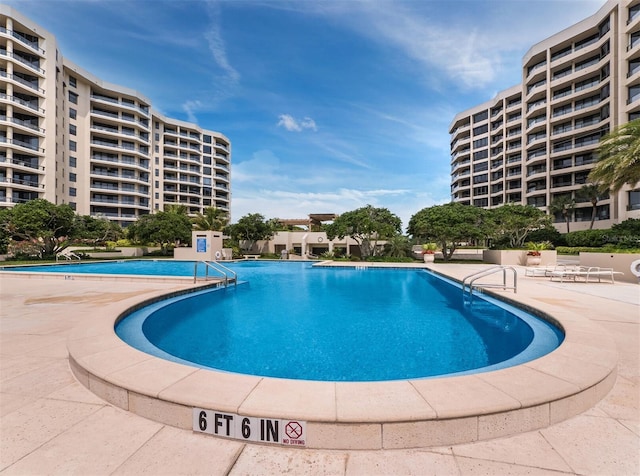 view of swimming pool featuring a patio