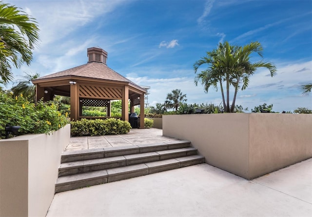 view of patio featuring a gazebo