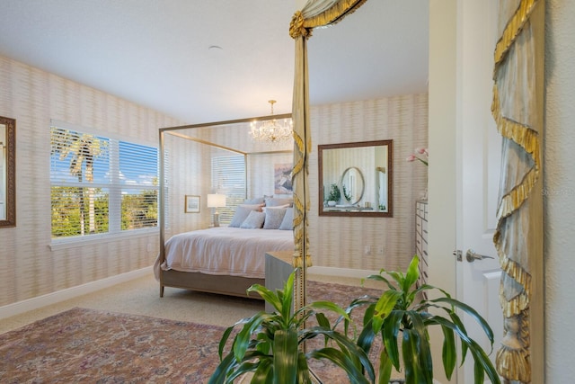 carpeted bedroom with a notable chandelier