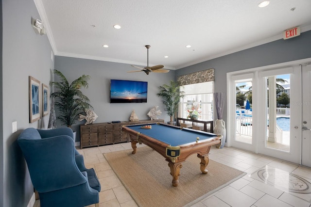 game room featuring ceiling fan, french doors, billiards, light tile patterned floors, and ornamental molding