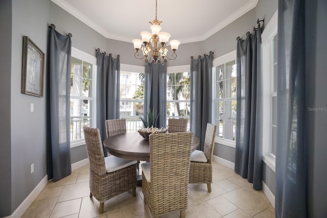 tiled dining area featuring a chandelier and ornamental molding