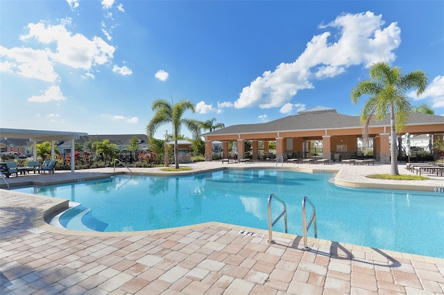 view of swimming pool featuring a patio