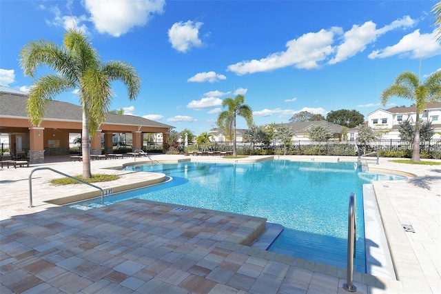 view of swimming pool with a patio area