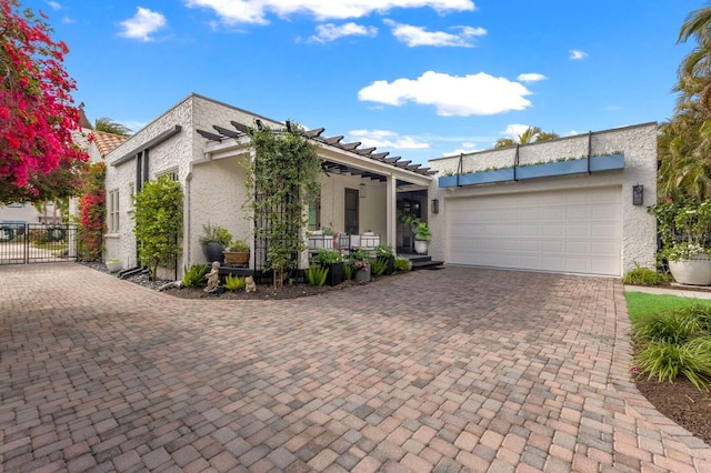 view of front of house with covered porch and a garage