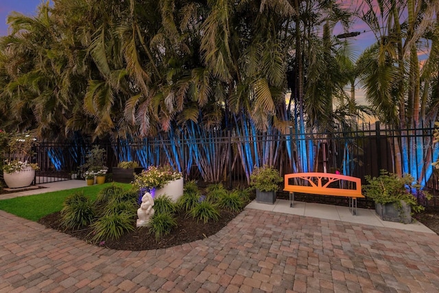 view of patio terrace at dusk