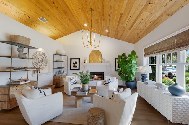 living room featuring vaulted ceiling, wood ceiling, dark hardwood / wood-style floors, and a notable chandelier