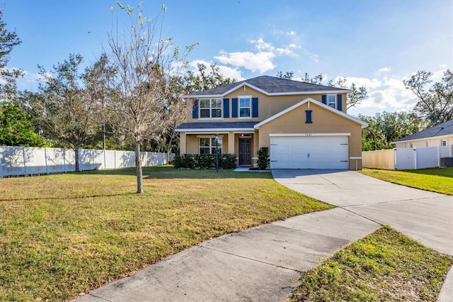 view of front property featuring a front yard and a garage