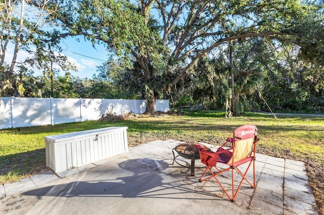 view of patio featuring a fire pit