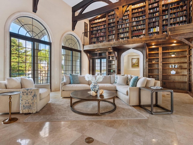 living room with a high ceiling