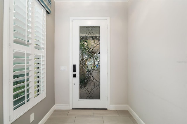 entryway with light tile patterned floors