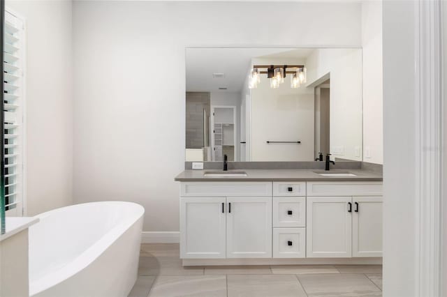 bathroom featuring a bathing tub and vanity