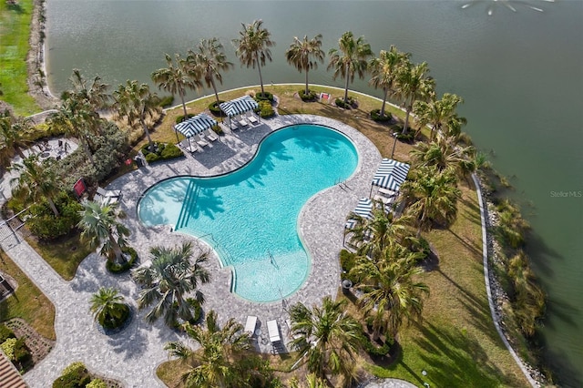 view of swimming pool with a water view