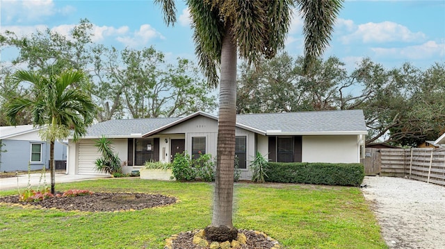 single story home with a front yard