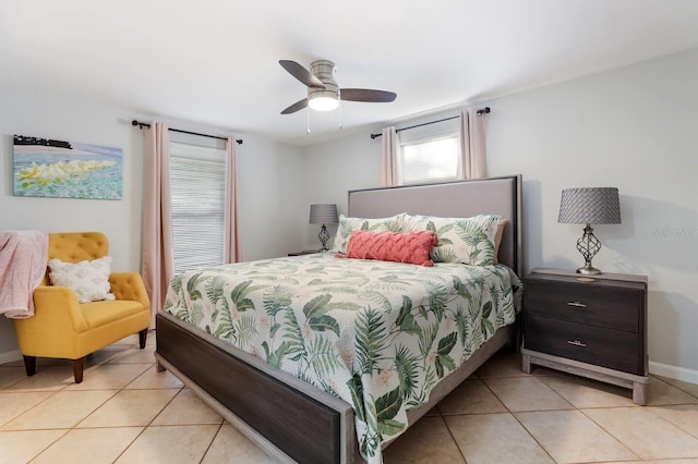 tiled bedroom with ceiling fan